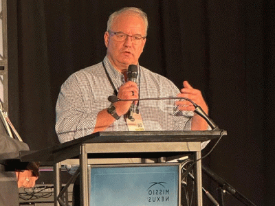 Brent McHugh accepts the eXcelerate Award from Missio Nexus. (Photo provided) 